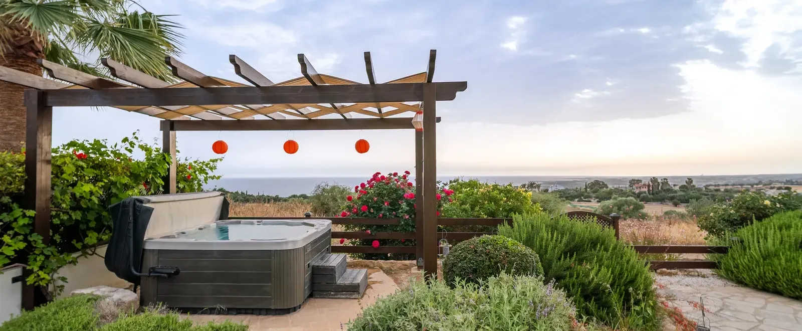 The hot tub at Villa Panorama with views over the hills and the sea