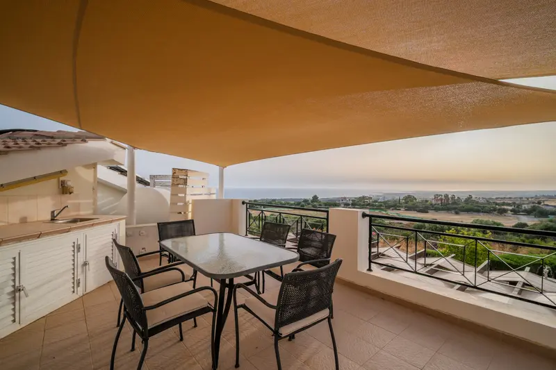 Rooftop terrace with amazing panoramic view and dining facility for six. In the warmer months, we put up large sun shade sails to provide shade on the roof.