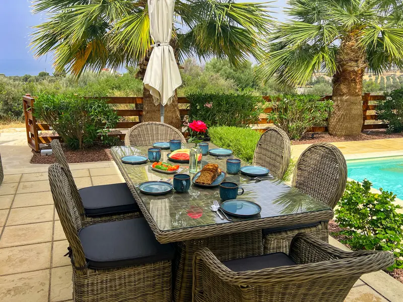Dine outdoors on the patio while enjoying the views - perfect for family meals.