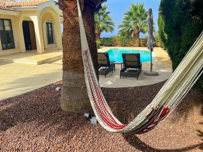 Lounge by the pool on the sun loungers or in the hammock in the shade of the palm trees. Whether you're seeking sun or shade, the different outdoor spaces provides plenty of options throughout the day.