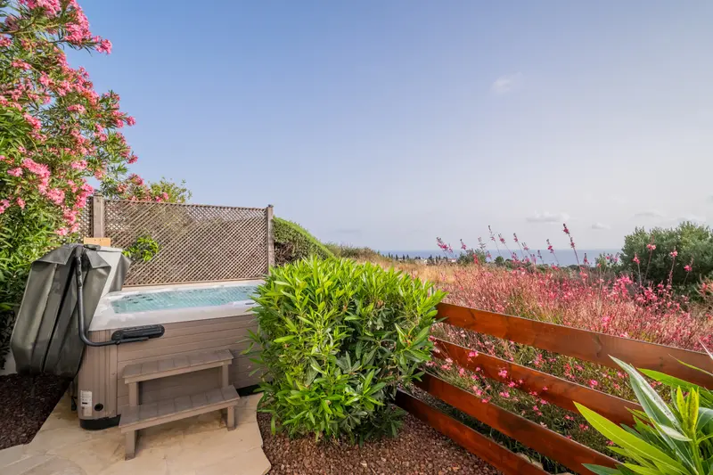 Take in breathtaking views of the sea and the Troodos foothills while soaking in the outdoor hot tub, large enough to fit six people.