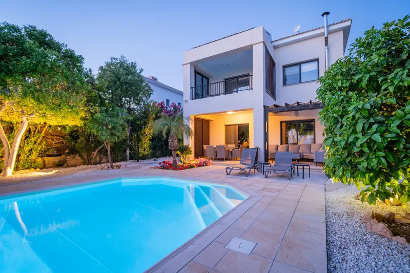 Villa Pontus, a 2-story villa with private swimming pool, at dusk