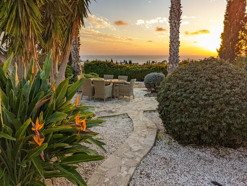 Gather around the second outdoor dining table nestled in the heart of the garden - ideal for breakfast, lunch, or enjoying the sunset.