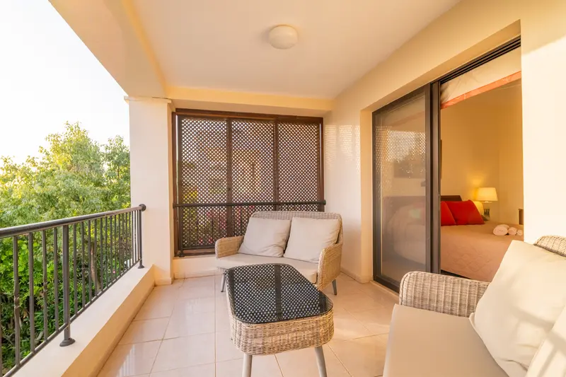 Balcony with stunning views off the master bedroom featuring comfortable seating for your morning coffee or evening drink.