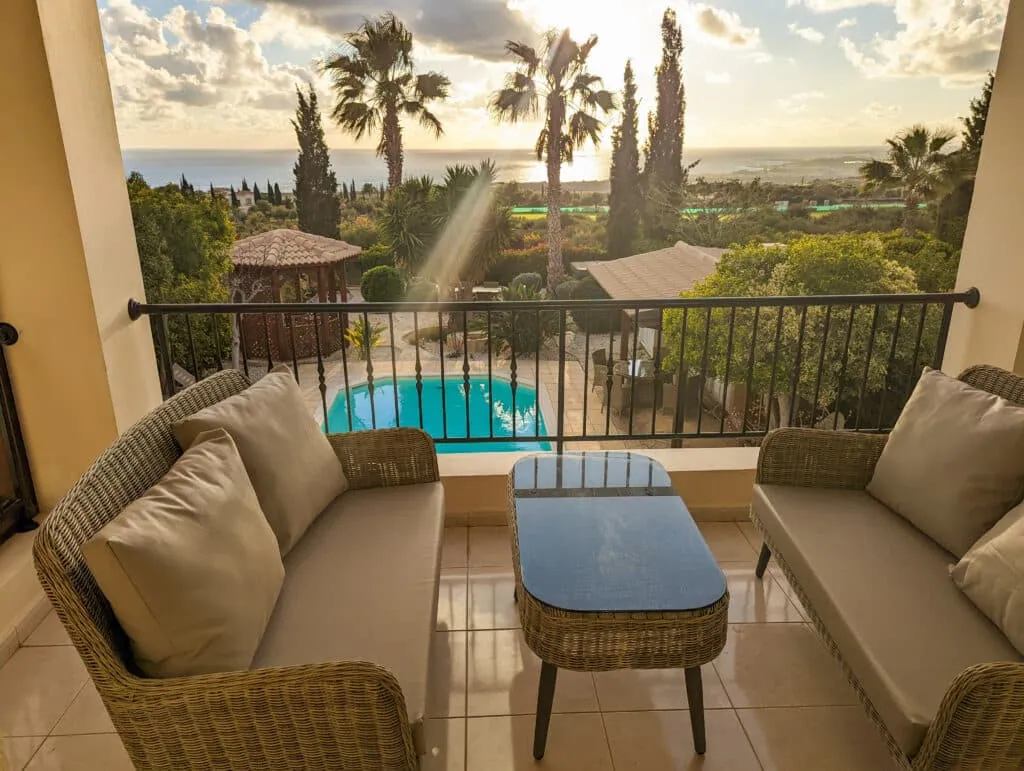 Balcony seating at Villa Pontus overlooking the pool and the Mediterranean
